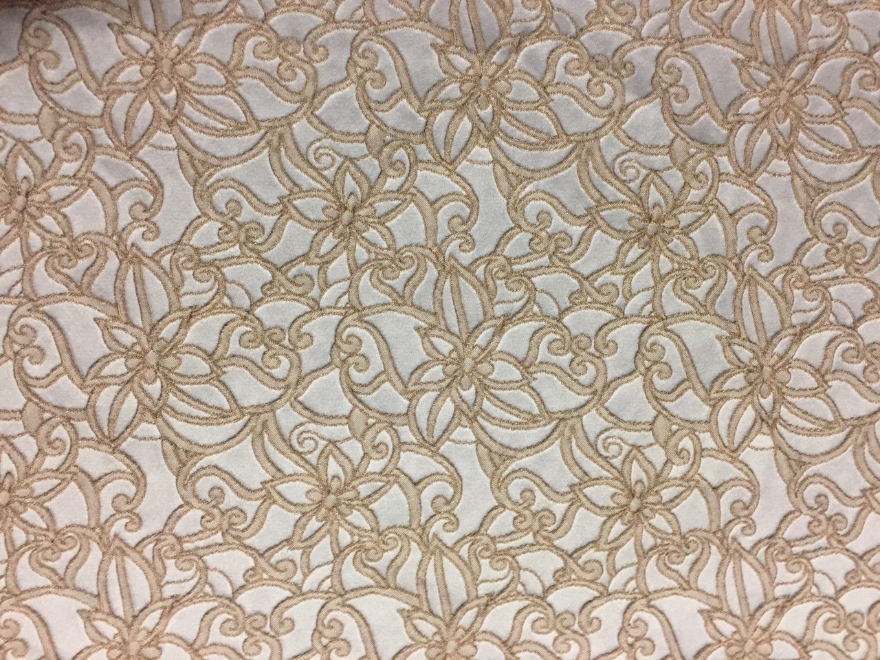 Jacquard fabric, floral motif. Close-up of elegant and splendid