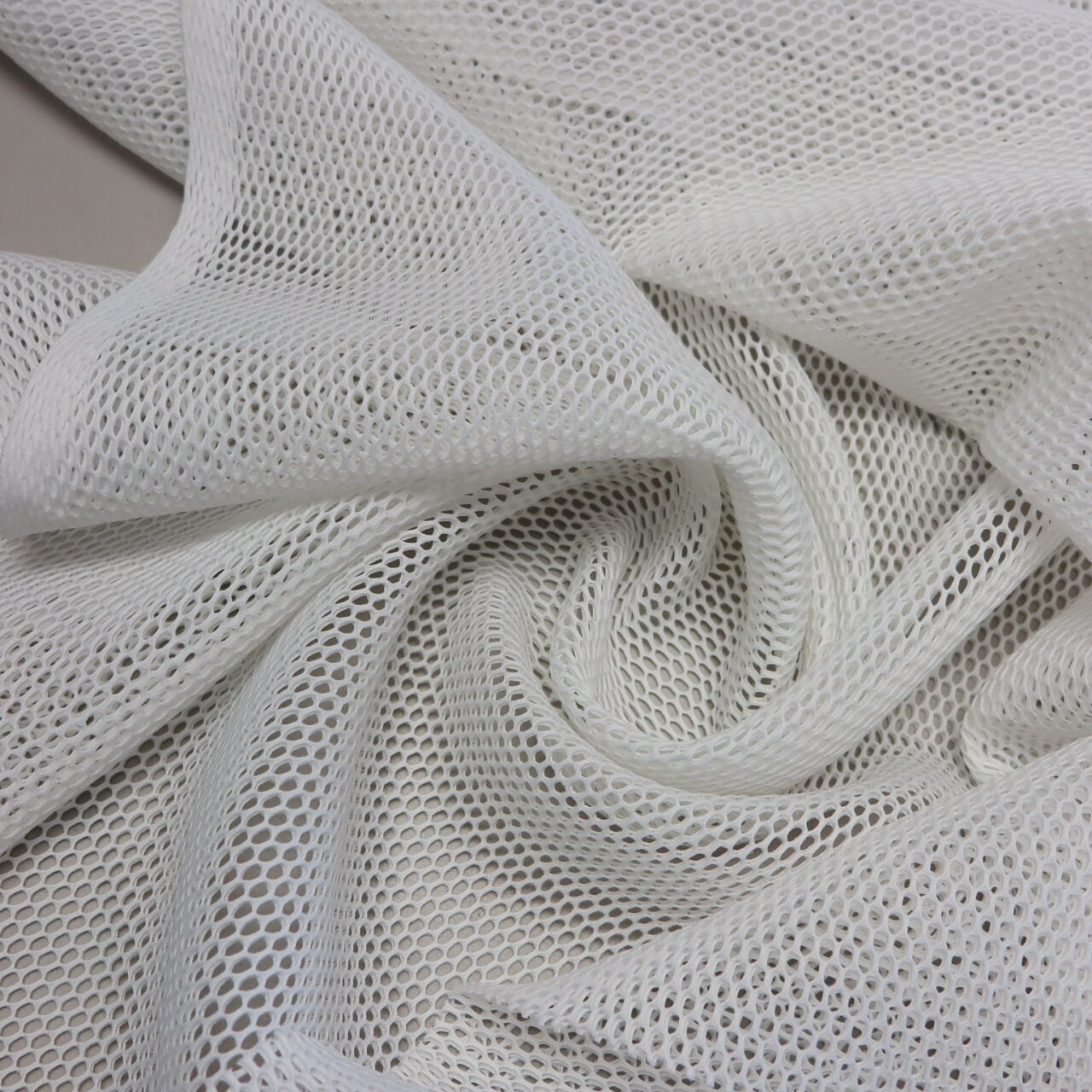 Stretch Netting Fabric with a Padded Texture, White • Promenade Fine Fabrics